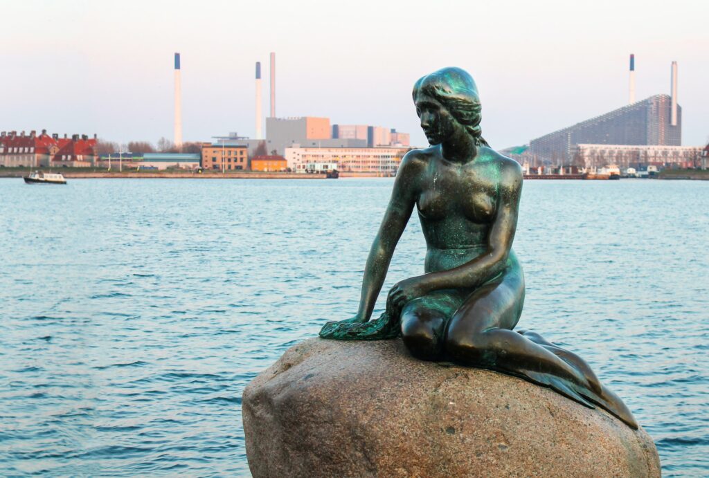 The Statue of the Little Mermaid on a Rock in Copenhagen, Denmark