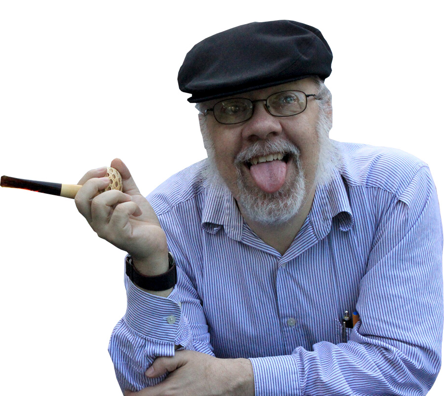 Ira Nayman, sticking his tongue out at the camera, holding a pipe and wearing a hat